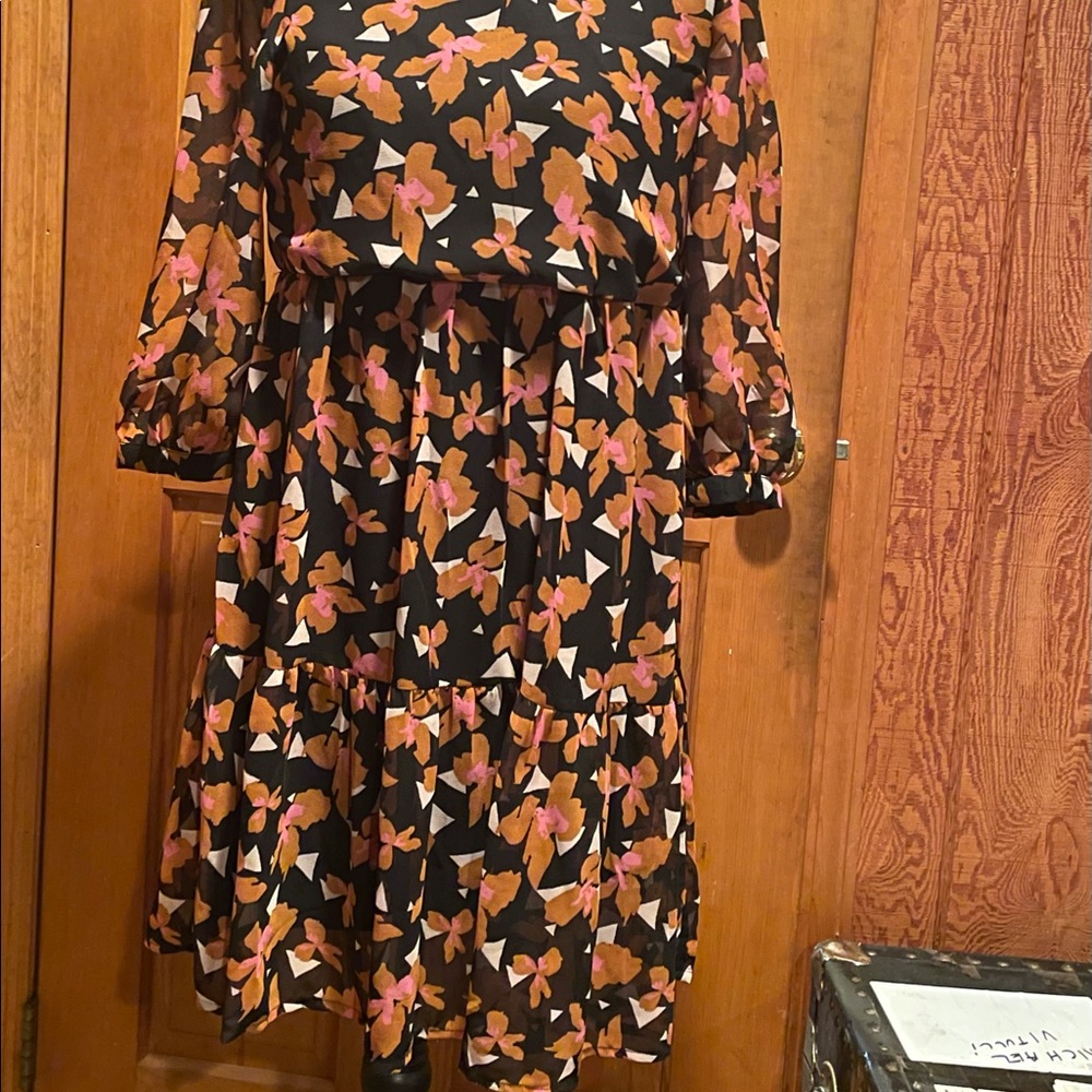 Adorable mini dress made from recycled fibers.